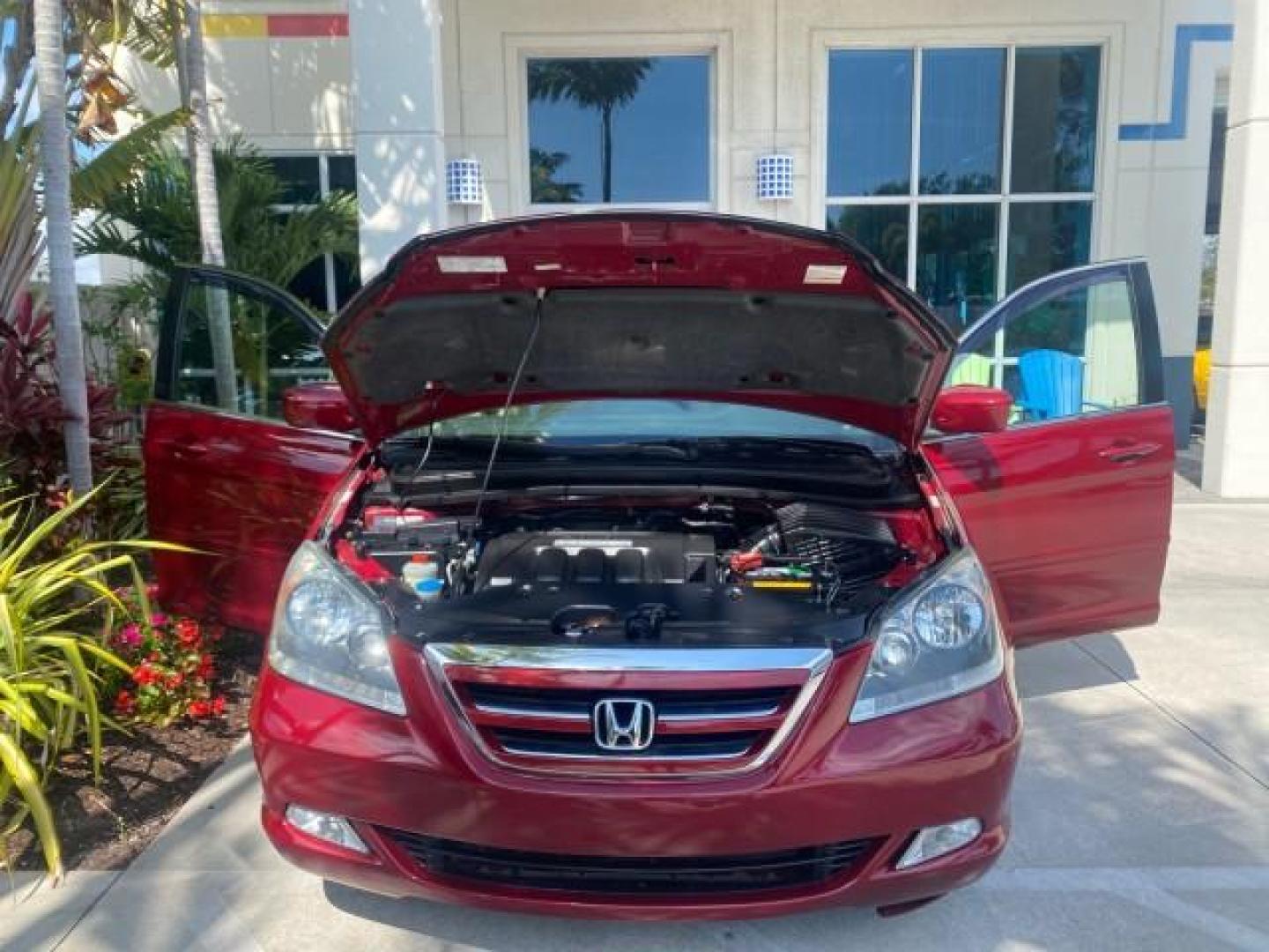 2005 Redrock Pearl /Ivory Honda Odyssey TOURING LOW MILES 62,337 FL (5FNRL38815B) with an 3.5L SOHC MPFI 24-Valve i-VTEC V6 Engine engine, Automatic transmission, located at 4701 North Dixie Hwy, Pompano Beach, FL, 33064, (954) 422-2889, 26.240938, -80.123474 - OUR WEBPAGE FLORIDACARS1.COM HAS OVER 100 PHOTOS AND FREE CARFAX LINK 2005 Honda Odyssey Touring LOADED LEATHER SUNROOF NAVIGATION Van 3.5L V6 F SOHC 24V Gasoline 28 MPG Front Wheel Drive Features ABS Brakes Air Conditioning Alloy Wheels AM/FM Stereo Automatic Transmission Auxiliary Audio Input CD A- Photo#17