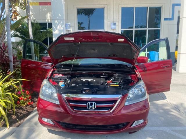 2005 Redrock Pearl /Ivory Honda Odyssey TOURING LOW MILES 62,337 FL (5FNRL38815B) with an 3.5L SOHC MPFI 24-Valve i-VTEC V6 Engine engine, Automatic transmission, located at 4701 North Dixie Hwy, Pompano Beach, FL, 33064, (954) 422-2889, 26.240938, -80.123474 - OUR WEBPAGE FLORIDACARS1.COM HAS OVER 100 PHOTOS AND FREE CARFAX LINK 2005 Honda Odyssey Touring LOADED LEATHER SUNROOF NAVIGATION Van 3.5L V6 F SOHC 24V Gasoline 28 MPG Front Wheel Drive Features ABS Brakes Air Conditioning Alloy Wheels AM/FM Stereo Automatic Transmission Auxiliary Audio Input CD A - Photo#17