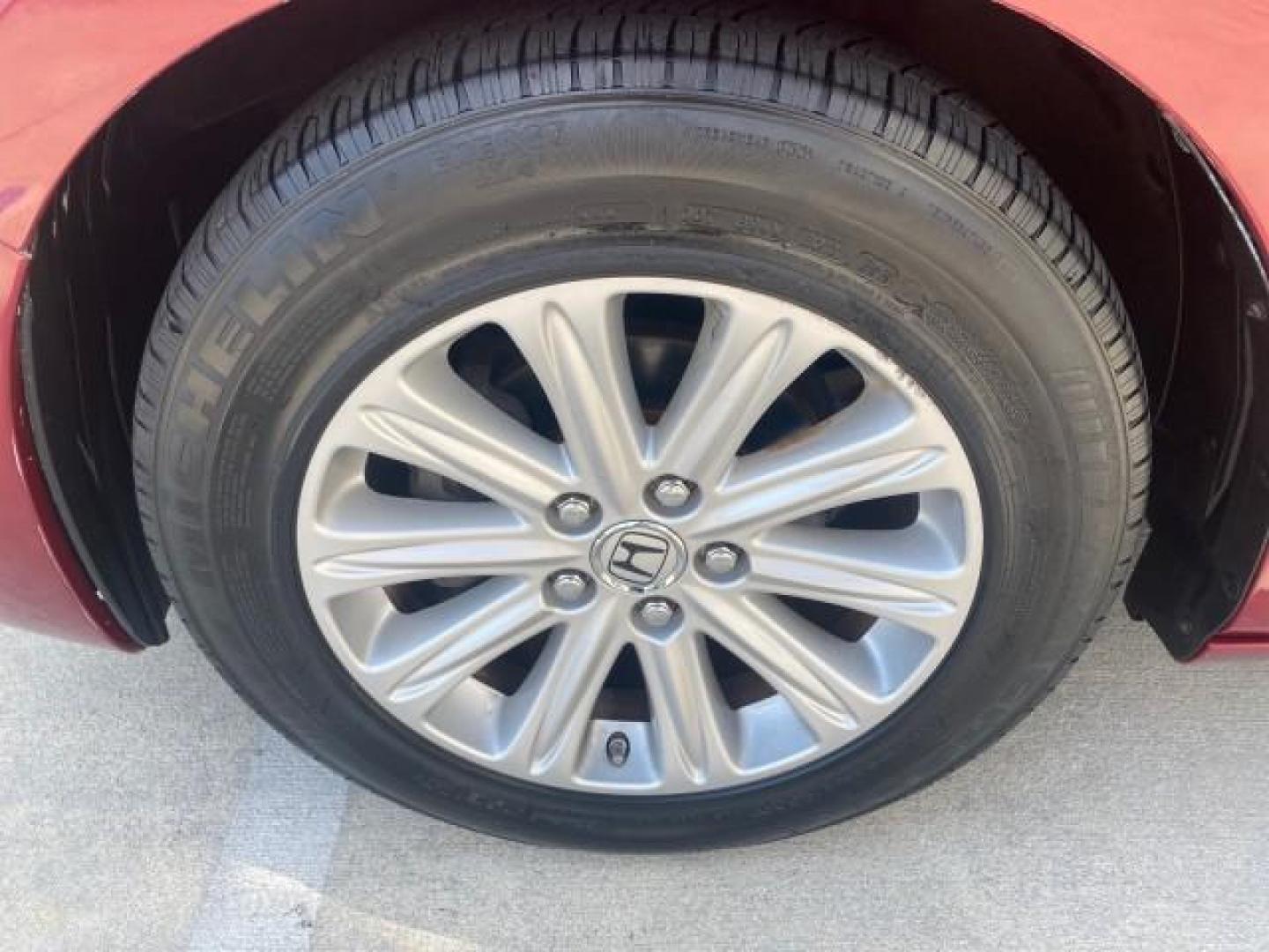 2005 Redrock Pearl /Ivory Honda Odyssey TOURING LOW MILES 62,337 FL (5FNRL38815B) with an 3.5L SOHC MPFI 24-Valve i-VTEC V6 Engine engine, Automatic transmission, located at 4701 North Dixie Hwy, Pompano Beach, FL, 33064, (954) 422-2889, 26.240938, -80.123474 - OUR WEBPAGE FLORIDACARS1.COM HAS OVER 100 PHOTOS AND FREE CARFAX LINK 2005 Honda Odyssey Touring LOADED LEATHER SUNROOF NAVIGATION Van 3.5L V6 F SOHC 24V Gasoline 28 MPG Front Wheel Drive Features ABS Brakes Air Conditioning Alloy Wheels AM/FM Stereo Automatic Transmission Auxiliary Audio Input CD A- Photo#19
