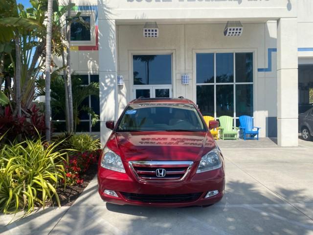 2005 Redrock Pearl /Ivory Honda Odyssey TOURING LOW MILES 62,337 FL (5FNRL38815B) with an 3.5L SOHC MPFI 24-Valve i-VTEC V6 Engine engine, Automatic transmission, located at 4701 North Dixie Hwy, Pompano Beach, FL, 33064, (954) 422-2889, 26.240938, -80.123474 - OUR WEBPAGE FLORIDACARS1.COM HAS OVER 100 PHOTOS AND FREE CARFAX LINK 2005 Honda Odyssey Touring LOADED LEATHER SUNROOF NAVIGATION Van 3.5L V6 F SOHC 24V Gasoline 28 MPG Front Wheel Drive Features ABS Brakes Air Conditioning Alloy Wheels AM/FM Stereo Automatic Transmission Auxiliary Audio Input CD A - Photo#24