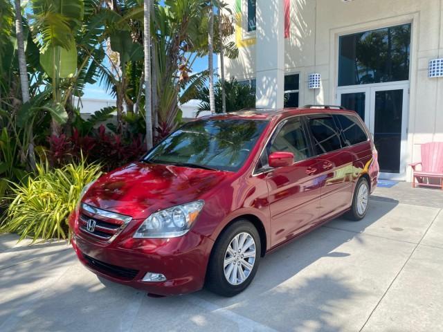 2005 Redrock Pearl /Ivory Honda Odyssey TOURING LOW MILES 62,337 FL (5FNRL38815B) with an 3.5L SOHC MPFI 24-Valve i-VTEC V6 Engine engine, Automatic transmission, located at 4701 North Dixie Hwy, Pompano Beach, FL, 33064, (954) 422-2889, 26.240938, -80.123474 - OUR WEBPAGE FLORIDACARS1.COM HAS OVER 100 PHOTOS AND FREE CARFAX LINK 2005 Honda Odyssey Touring LOADED LEATHER SUNROOF NAVIGATION Van 3.5L V6 F SOHC 24V Gasoline 28 MPG Front Wheel Drive Features ABS Brakes Air Conditioning Alloy Wheels AM/FM Stereo Automatic Transmission Auxiliary Audio Input CD A - Photo#26
