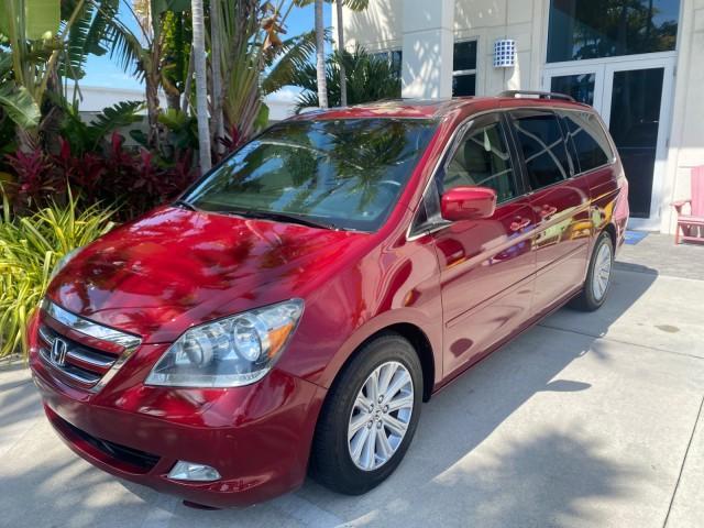 2005 Redrock Pearl /Ivory Honda Odyssey TOURING LOW MILES 62,337 FL (5FNRL38815B) with an 3.5L SOHC MPFI 24-Valve i-VTEC V6 Engine engine, Automatic transmission, located at 4701 North Dixie Hwy, Pompano Beach, FL, 33064, (954) 422-2889, 26.240938, -80.123474 - OUR WEBPAGE FLORIDACARS1.COM HAS OVER 100 PHOTOS AND FREE CARFAX LINK 2005 Honda Odyssey Touring LOADED LEATHER SUNROOF NAVIGATION Van 3.5L V6 F SOHC 24V Gasoline 28 MPG Front Wheel Drive Features ABS Brakes Air Conditioning Alloy Wheels AM/FM Stereo Automatic Transmission Auxiliary Audio Input CD A - Photo#27