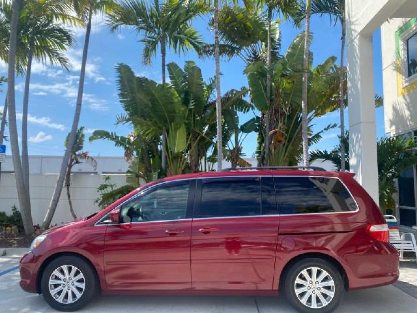 2005 Redrock Pearl /Ivory Honda Odyssey TOURING LOW MILES 62,337 FL (5FNRL38815B) with an 3.5L SOHC MPFI 24-Valve i-VTEC V6 Engine engine, Automatic transmission, located at 4701 North Dixie Hwy, Pompano Beach, FL, 33064, (954) 422-2889, 26.240938, -80.123474 - OUR WEBPAGE FLORIDACARS1.COM HAS OVER 100 PHOTOS AND FREE CARFAX LINK 2005 Honda Odyssey Touring LOADED LEATHER SUNROOF NAVIGATION Van 3.5L V6 F SOHC 24V Gasoline 28 MPG Front Wheel Drive Features ABS Brakes Air Conditioning Alloy Wheels AM/FM Stereo Automatic Transmission Auxiliary Audio Input CD A- Photo#29