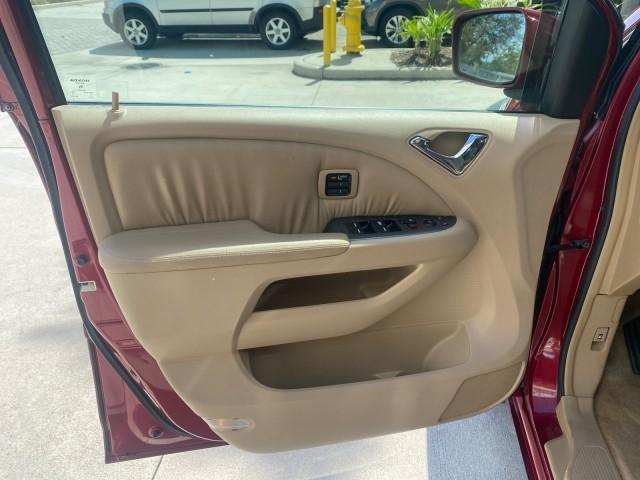 2005 Redrock Pearl /Ivory Honda Odyssey TOURING LOW MILES 62,337 FL (5FNRL38815B) with an 3.5L SOHC MPFI 24-Valve i-VTEC V6 Engine engine, Automatic transmission, located at 4701 North Dixie Hwy, Pompano Beach, FL, 33064, (954) 422-2889, 26.240938, -80.123474 - OUR WEBPAGE FLORIDACARS1.COM HAS OVER 100 PHOTOS AND FREE CARFAX LINK 2005 Honda Odyssey Touring LOADED LEATHER SUNROOF NAVIGATION Van 3.5L V6 F SOHC 24V Gasoline 28 MPG Front Wheel Drive Features ABS Brakes Air Conditioning Alloy Wheels AM/FM Stereo Automatic Transmission Auxiliary Audio Input CD A - Photo#39