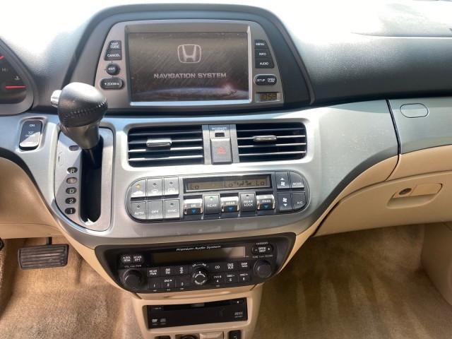 2005 Redrock Pearl /Ivory Honda Odyssey TOURING LOW MILES 62,337 FL (5FNRL38815B) with an 3.5L SOHC MPFI 24-Valve i-VTEC V6 Engine engine, Automatic transmission, located at 4701 North Dixie Hwy, Pompano Beach, FL, 33064, (954) 422-2889, 26.240938, -80.123474 - OUR WEBPAGE FLORIDACARS1.COM HAS OVER 100 PHOTOS AND FREE CARFAX LINK 2005 Honda Odyssey Touring LOADED LEATHER SUNROOF NAVIGATION Van 3.5L V6 F SOHC 24V Gasoline 28 MPG Front Wheel Drive Features ABS Brakes Air Conditioning Alloy Wheels AM/FM Stereo Automatic Transmission Auxiliary Audio Input CD A - Photo#54