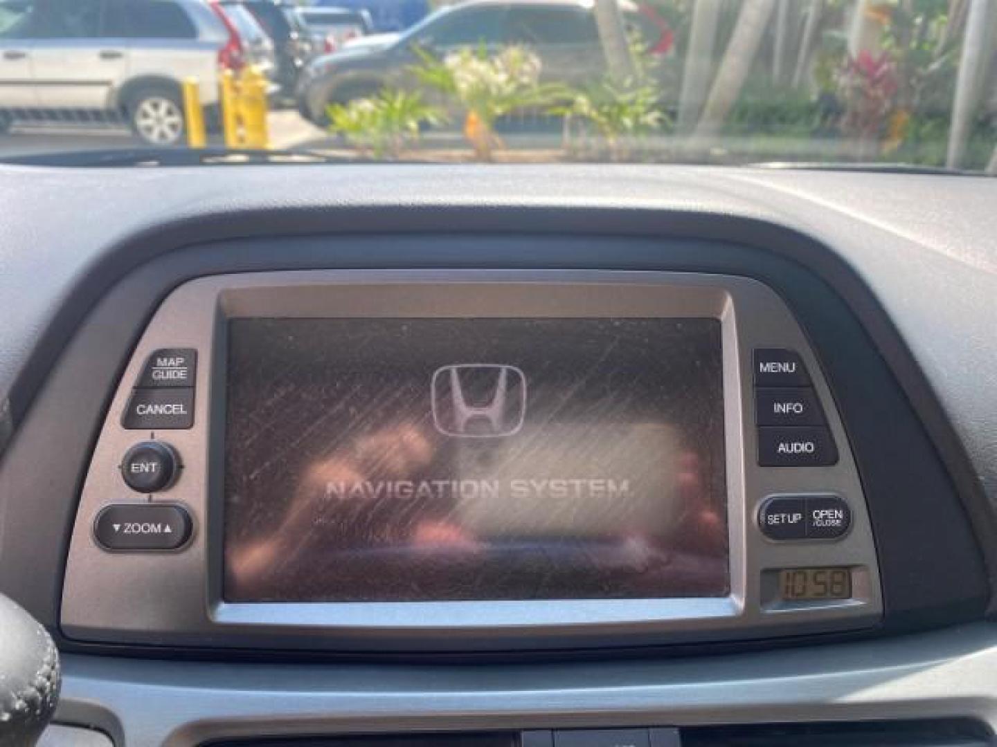 2005 Redrock Pearl /Ivory Honda Odyssey TOURING LOW MILES 62,337 FL (5FNRL38815B) with an 3.5L SOHC MPFI 24-Valve i-VTEC V6 Engine engine, Automatic transmission, located at 4701 North Dixie Hwy, Pompano Beach, FL, 33064, (954) 422-2889, 26.240938, -80.123474 - OUR WEBPAGE FLORIDACARS1.COM HAS OVER 100 PHOTOS AND FREE CARFAX LINK 2005 Honda Odyssey Touring LOADED LEATHER SUNROOF NAVIGATION Van 3.5L V6 F SOHC 24V Gasoline 28 MPG Front Wheel Drive Features ABS Brakes Air Conditioning Alloy Wheels AM/FM Stereo Automatic Transmission Auxiliary Audio Input CD A- Photo#55