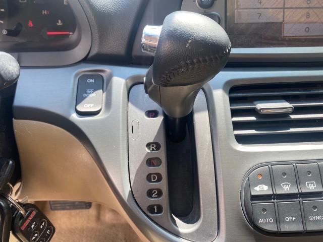 2005 Redrock Pearl /Ivory Honda Odyssey TOURING LOW MILES 62,337 FL (5FNRL38815B) with an 3.5L SOHC MPFI 24-Valve i-VTEC V6 Engine engine, Automatic transmission, located at 4701 North Dixie Hwy, Pompano Beach, FL, 33064, (954) 422-2889, 26.240938, -80.123474 - OUR WEBPAGE FLORIDACARS1.COM HAS OVER 100 PHOTOS AND FREE CARFAX LINK 2005 Honda Odyssey Touring LOADED LEATHER SUNROOF NAVIGATION Van 3.5L V6 F SOHC 24V Gasoline 28 MPG Front Wheel Drive Features ABS Brakes Air Conditioning Alloy Wheels AM/FM Stereo Automatic Transmission Auxiliary Audio Input CD A - Photo#56