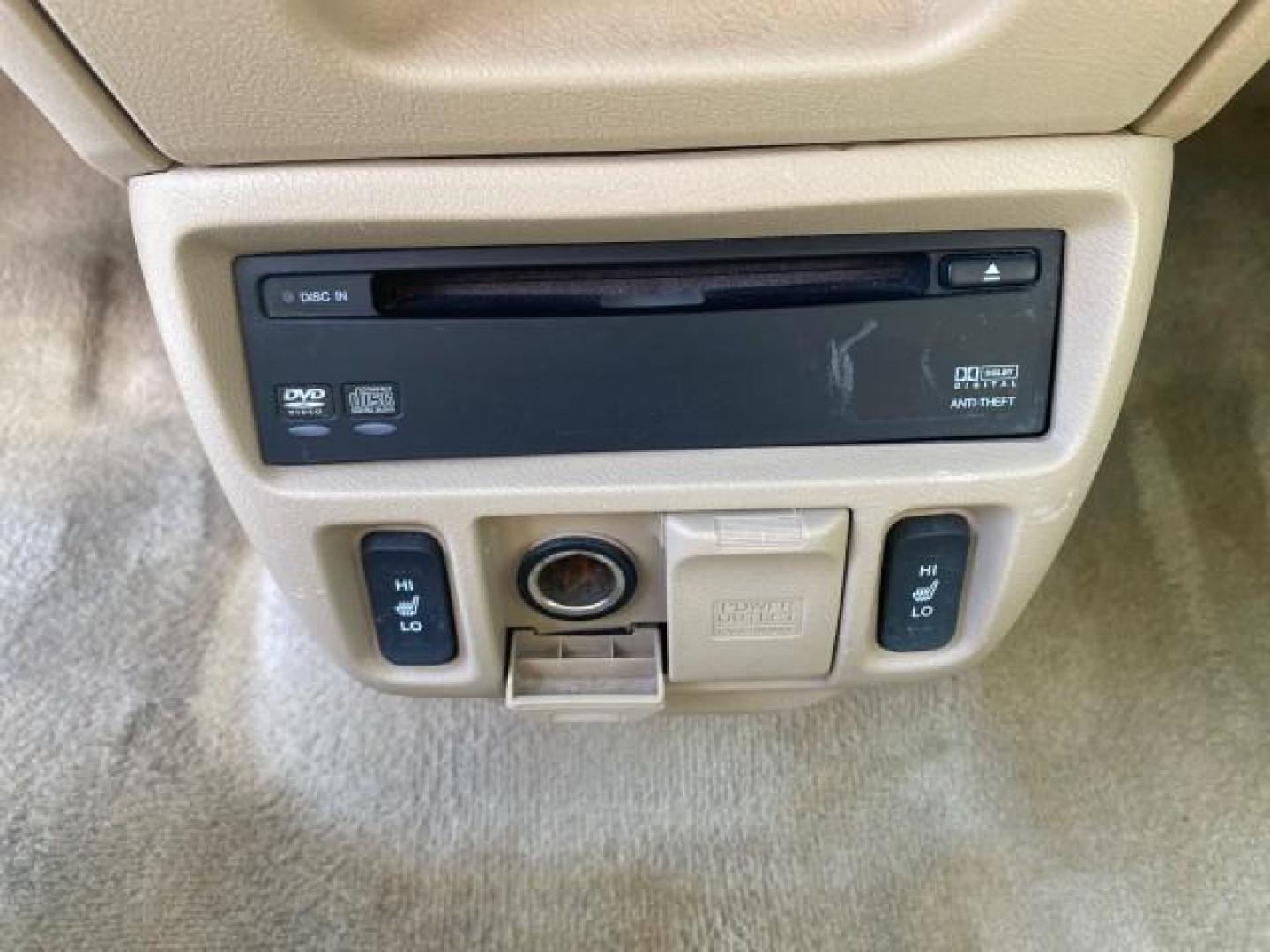 2005 Redrock Pearl /Ivory Honda Odyssey TOURING LOW MILES 62,337 FL (5FNRL38815B) with an 3.5L SOHC MPFI 24-Valve i-VTEC V6 Engine engine, Automatic transmission, located at 4701 North Dixie Hwy, Pompano Beach, FL, 33064, (954) 422-2889, 26.240938, -80.123474 - OUR WEBPAGE FLORIDACARS1.COM HAS OVER 100 PHOTOS AND FREE CARFAX LINK 2005 Honda Odyssey Touring LOADED LEATHER SUNROOF NAVIGATION Van 3.5L V6 F SOHC 24V Gasoline 28 MPG Front Wheel Drive Features ABS Brakes Air Conditioning Alloy Wheels AM/FM Stereo Automatic Transmission Auxiliary Audio Input CD A- Photo#59