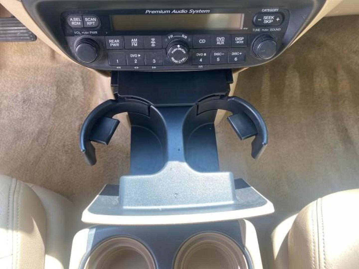 2005 Redrock Pearl /Ivory Honda Odyssey TOURING LOW MILES 62,337 FL (5FNRL38815B) with an 3.5L SOHC MPFI 24-Valve i-VTEC V6 Engine engine, Automatic transmission, located at 4701 North Dixie Hwy, Pompano Beach, FL, 33064, (954) 422-2889, 26.240938, -80.123474 - OUR WEBPAGE FLORIDACARS1.COM HAS OVER 100 PHOTOS AND FREE CARFAX LINK 2005 Honda Odyssey Touring LOADED LEATHER SUNROOF NAVIGATION Van 3.5L V6 F SOHC 24V Gasoline 28 MPG Front Wheel Drive Features ABS Brakes Air Conditioning Alloy Wheels AM/FM Stereo Automatic Transmission Auxiliary Audio Input CD A- Photo#60
