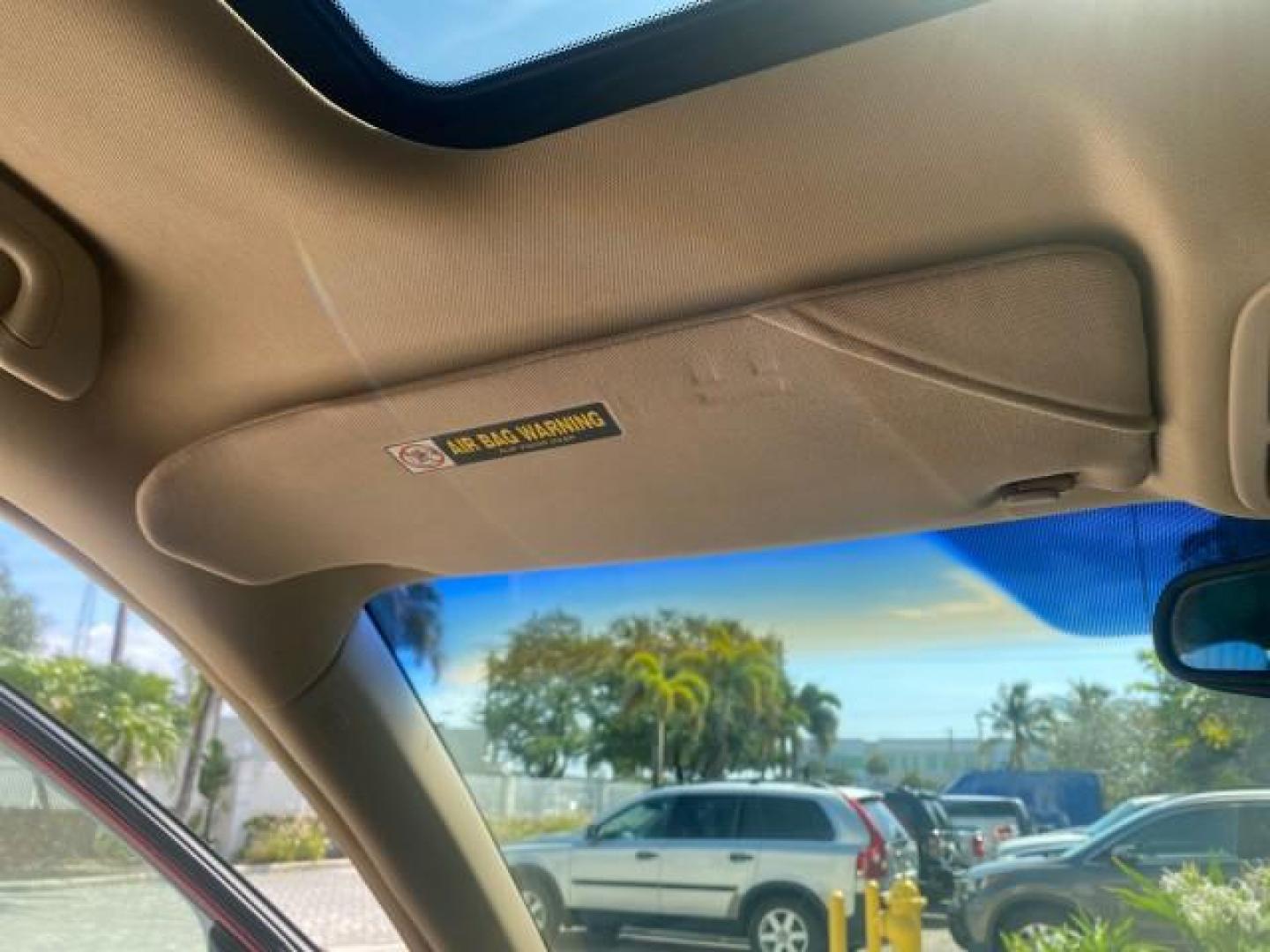 2005 Redrock Pearl /Ivory Honda Odyssey TOURING LOW MILES 62,337 FL (5FNRL38815B) with an 3.5L SOHC MPFI 24-Valve i-VTEC V6 Engine engine, Automatic transmission, located at 4701 North Dixie Hwy, Pompano Beach, FL, 33064, (954) 422-2889, 26.240938, -80.123474 - OUR WEBPAGE FLORIDACARS1.COM HAS OVER 100 PHOTOS AND FREE CARFAX LINK 2005 Honda Odyssey Touring LOADED LEATHER SUNROOF NAVIGATION Van 3.5L V6 F SOHC 24V Gasoline 28 MPG Front Wheel Drive Features ABS Brakes Air Conditioning Alloy Wheels AM/FM Stereo Automatic Transmission Auxiliary Audio Input CD A- Photo#66