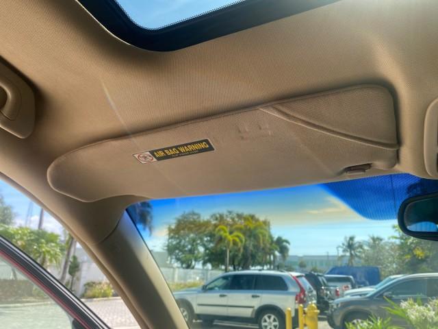 2005 Redrock Pearl /Ivory Honda Odyssey TOURING LOW MILES 62,337 FL (5FNRL38815B) with an 3.5L SOHC MPFI 24-Valve i-VTEC V6 Engine engine, Automatic transmission, located at 4701 North Dixie Hwy, Pompano Beach, FL, 33064, (954) 422-2889, 26.240938, -80.123474 - OUR WEBPAGE FLORIDACARS1.COM HAS OVER 100 PHOTOS AND FREE CARFAX LINK 2005 Honda Odyssey Touring LOADED LEATHER SUNROOF NAVIGATION Van 3.5L V6 F SOHC 24V Gasoline 28 MPG Front Wheel Drive Features ABS Brakes Air Conditioning Alloy Wheels AM/FM Stereo Automatic Transmission Auxiliary Audio Input CD A - Photo#66