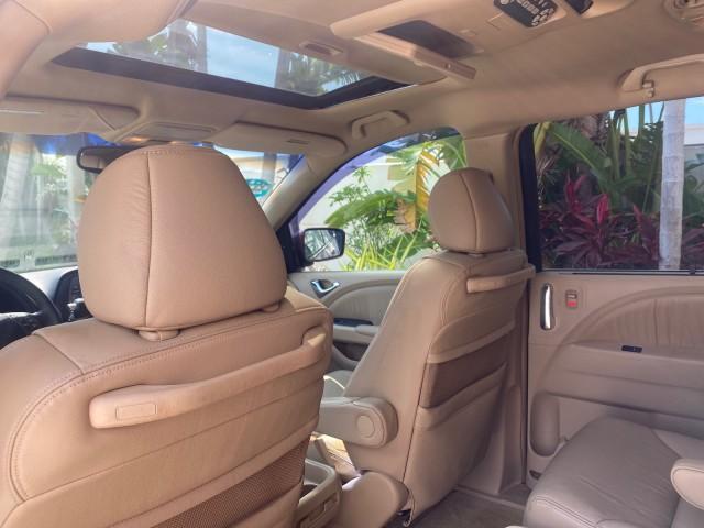 2005 Redrock Pearl /Ivory Honda Odyssey TOURING LOW MILES 62,337 FL (5FNRL38815B) with an 3.5L SOHC MPFI 24-Valve i-VTEC V6 Engine engine, Automatic transmission, located at 4701 North Dixie Hwy, Pompano Beach, FL, 33064, (954) 422-2889, 26.240938, -80.123474 - OUR WEBPAGE FLORIDACARS1.COM HAS OVER 100 PHOTOS AND FREE CARFAX LINK 2005 Honda Odyssey Touring LOADED LEATHER SUNROOF NAVIGATION Van 3.5L V6 F SOHC 24V Gasoline 28 MPG Front Wheel Drive Features ABS Brakes Air Conditioning Alloy Wheels AM/FM Stereo Automatic Transmission Auxiliary Audio Input CD A - Photo#80