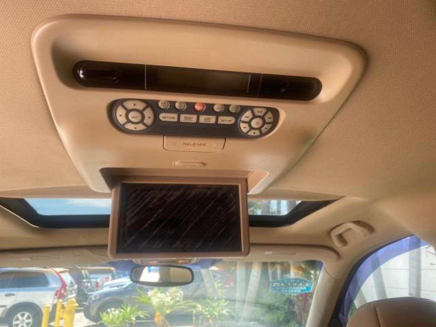2005 Redrock Pearl /Ivory Honda Odyssey TOURING LOW MILES 62,337 FL (5FNRL38815B) with an 3.5L SOHC MPFI 24-Valve i-VTEC V6 Engine engine, Automatic transmission, located at 4701 North Dixie Hwy, Pompano Beach, FL, 33064, (954) 422-2889, 26.240938, -80.123474 - OUR WEBPAGE FLORIDACARS1.COM HAS OVER 100 PHOTOS AND FREE CARFAX LINK 2005 Honda Odyssey Touring LOADED LEATHER SUNROOF NAVIGATION Van 3.5L V6 F SOHC 24V Gasoline 28 MPG Front Wheel Drive Features ABS Brakes Air Conditioning Alloy Wheels AM/FM Stereo Automatic Transmission Auxiliary Audio Input CD A- Photo#82