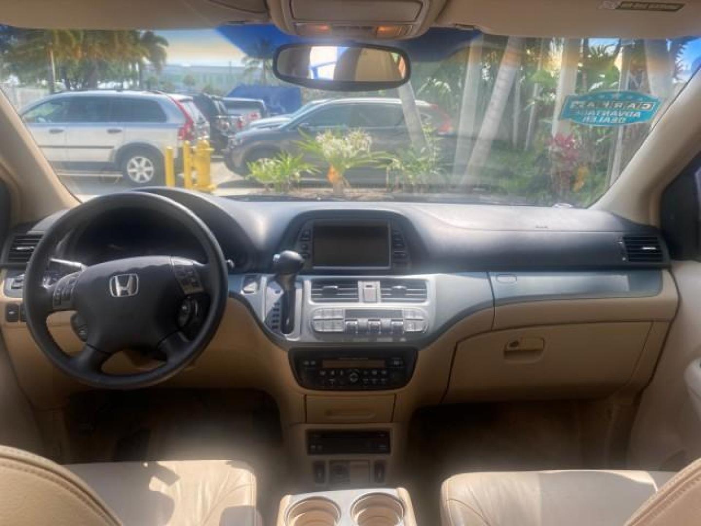 2005 Redrock Pearl /Ivory Honda Odyssey TOURING LOW MILES 62,337 FL (5FNRL38815B) with an 3.5L SOHC MPFI 24-Valve i-VTEC V6 Engine engine, Automatic transmission, located at 4701 North Dixie Hwy, Pompano Beach, FL, 33064, (954) 422-2889, 26.240938, -80.123474 - OUR WEBPAGE FLORIDACARS1.COM HAS OVER 100 PHOTOS AND FREE CARFAX LINK 2005 Honda Odyssey Touring LOADED LEATHER SUNROOF NAVIGATION Van 3.5L V6 F SOHC 24V Gasoline 28 MPG Front Wheel Drive Features ABS Brakes Air Conditioning Alloy Wheels AM/FM Stereo Automatic Transmission Auxiliary Audio Input CD A- Photo#83