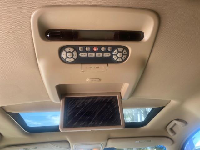 2005 Redrock Pearl /Ivory Honda Odyssey TOURING LOW MILES 62,337 FL (5FNRL38815B) with an 3.5L SOHC MPFI 24-Valve i-VTEC V6 Engine engine, Automatic transmission, located at 4701 North Dixie Hwy, Pompano Beach, FL, 33064, (954) 422-2889, 26.240938, -80.123474 - OUR WEBPAGE FLORIDACARS1.COM HAS OVER 100 PHOTOS AND FREE CARFAX LINK 2005 Honda Odyssey Touring LOADED LEATHER SUNROOF NAVIGATION Van 3.5L V6 F SOHC 24V Gasoline 28 MPG Front Wheel Drive Features ABS Brakes Air Conditioning Alloy Wheels AM/FM Stereo Automatic Transmission Auxiliary Audio Input CD A - Photo#84