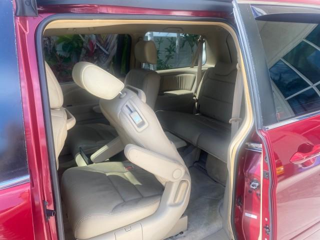 2005 Redrock Pearl /Ivory Honda Odyssey TOURING LOW MILES 62,337 FL (5FNRL38815B) with an 3.5L SOHC MPFI 24-Valve i-VTEC V6 Engine engine, Automatic transmission, located at 4701 North Dixie Hwy, Pompano Beach, FL, 33064, (954) 422-2889, 26.240938, -80.123474 - OUR WEBPAGE FLORIDACARS1.COM HAS OVER 100 PHOTOS AND FREE CARFAX LINK 2005 Honda Odyssey Touring LOADED LEATHER SUNROOF NAVIGATION Van 3.5L V6 F SOHC 24V Gasoline 28 MPG Front Wheel Drive Features ABS Brakes Air Conditioning Alloy Wheels AM/FM Stereo Automatic Transmission Auxiliary Audio Input CD A - Photo#88