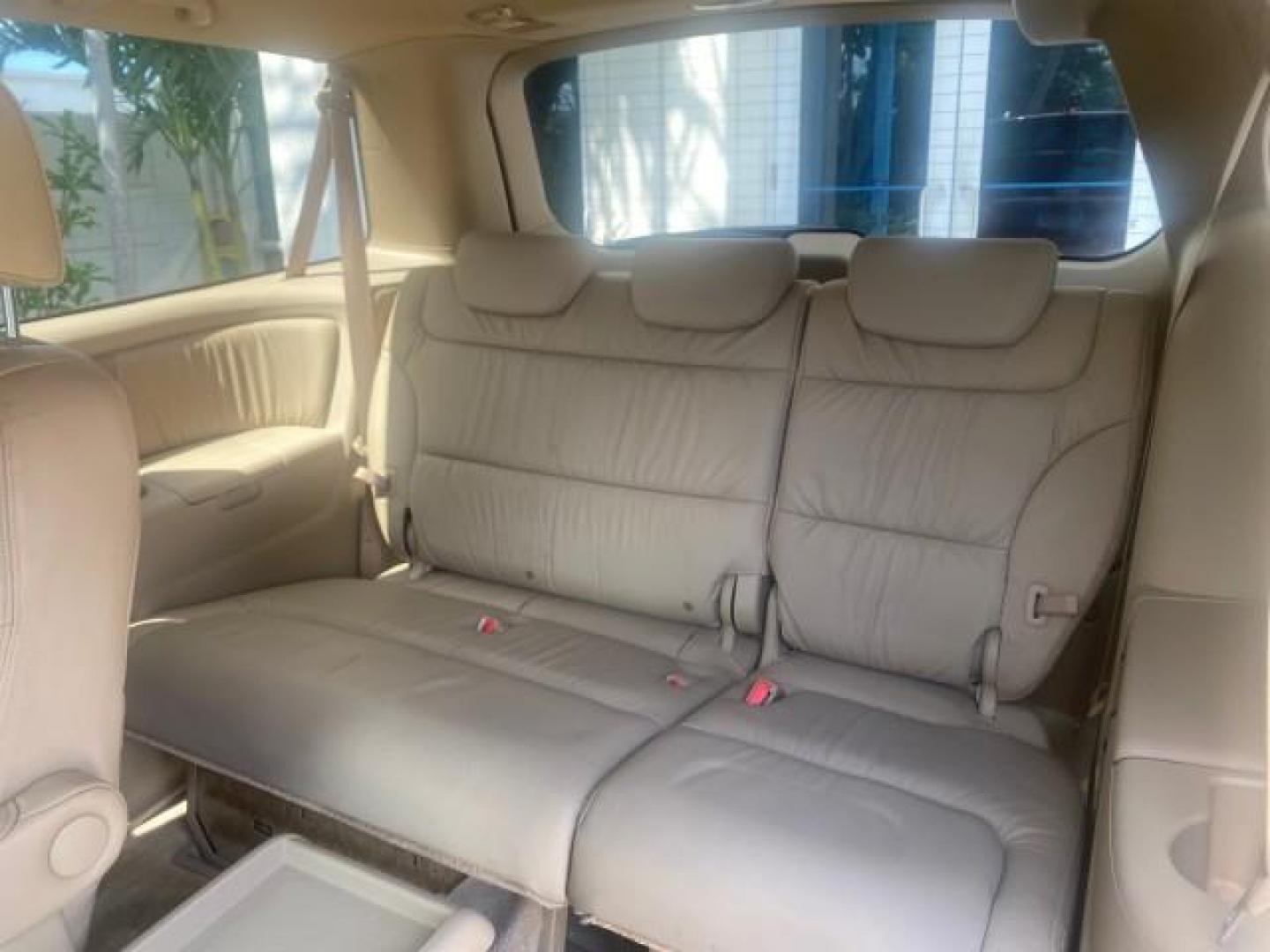 2005 Redrock Pearl /Ivory Honda Odyssey TOURING LOW MILES 62,337 FL (5FNRL38815B) with an 3.5L SOHC MPFI 24-Valve i-VTEC V6 Engine engine, Automatic transmission, located at 4701 North Dixie Hwy, Pompano Beach, FL, 33064, (954) 422-2889, 26.240938, -80.123474 - OUR WEBPAGE FLORIDACARS1.COM HAS OVER 100 PHOTOS AND FREE CARFAX LINK 2005 Honda Odyssey Touring LOADED LEATHER SUNROOF NAVIGATION Van 3.5L V6 F SOHC 24V Gasoline 28 MPG Front Wheel Drive Features ABS Brakes Air Conditioning Alloy Wheels AM/FM Stereo Automatic Transmission Auxiliary Audio Input CD A- Photo#90