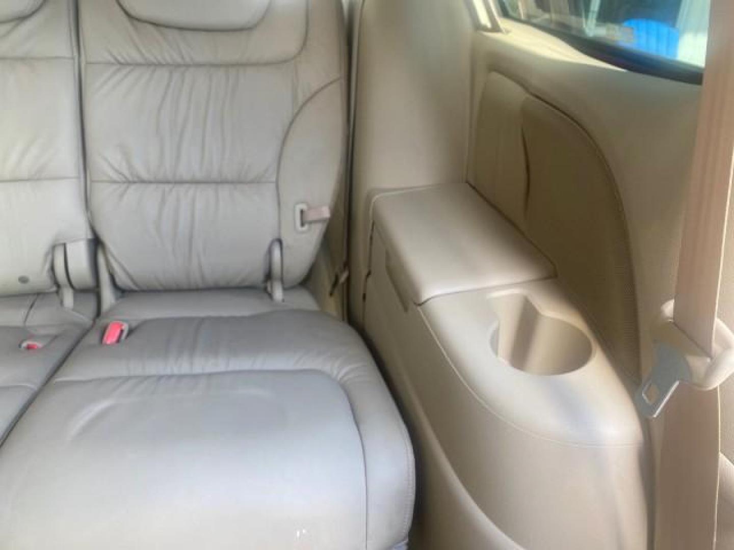 2005 Redrock Pearl /Ivory Honda Odyssey TOURING LOW MILES 62,337 FL (5FNRL38815B) with an 3.5L SOHC MPFI 24-Valve i-VTEC V6 Engine engine, Automatic transmission, located at 4701 North Dixie Hwy, Pompano Beach, FL, 33064, (954) 422-2889, 26.240938, -80.123474 - OUR WEBPAGE FLORIDACARS1.COM HAS OVER 100 PHOTOS AND FREE CARFAX LINK 2005 Honda Odyssey Touring LOADED LEATHER SUNROOF NAVIGATION Van 3.5L V6 F SOHC 24V Gasoline 28 MPG Front Wheel Drive Features ABS Brakes Air Conditioning Alloy Wheels AM/FM Stereo Automatic Transmission Auxiliary Audio Input CD A- Photo#92