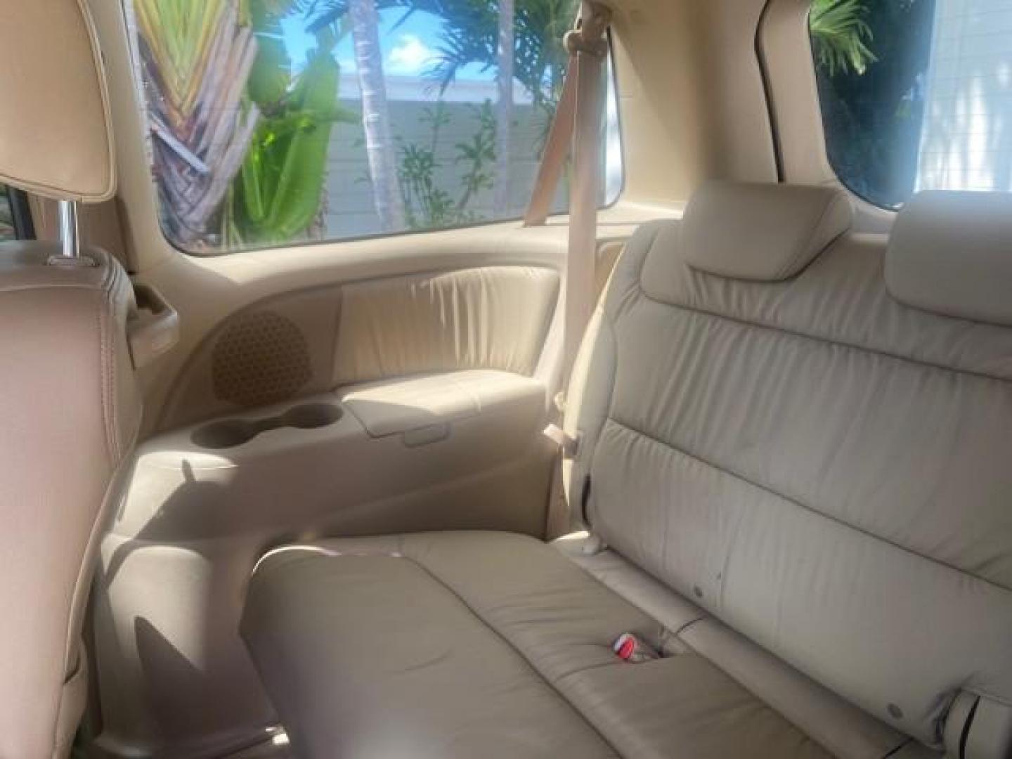 2005 Redrock Pearl /Ivory Honda Odyssey TOURING LOW MILES 62,337 FL (5FNRL38815B) with an 3.5L SOHC MPFI 24-Valve i-VTEC V6 Engine engine, Automatic transmission, located at 4701 North Dixie Hwy, Pompano Beach, FL, 33064, (954) 422-2889, 26.240938, -80.123474 - OUR WEBPAGE FLORIDACARS1.COM HAS OVER 100 PHOTOS AND FREE CARFAX LINK 2005 Honda Odyssey Touring LOADED LEATHER SUNROOF NAVIGATION Van 3.5L V6 F SOHC 24V Gasoline 28 MPG Front Wheel Drive Features ABS Brakes Air Conditioning Alloy Wheels AM/FM Stereo Automatic Transmission Auxiliary Audio Input CD A- Photo#93