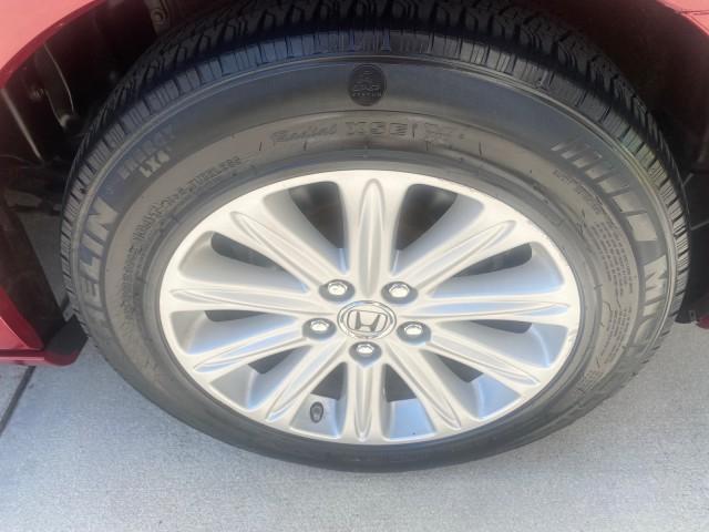 2005 Redrock Pearl /Ivory Honda Odyssey TOURING LOW MILES 62,337 FL (5FNRL38815B) with an 3.5L SOHC MPFI 24-Valve i-VTEC V6 Engine engine, Automatic transmission, located at 4701 North Dixie Hwy, Pompano Beach, FL, 33064, (954) 422-2889, 26.240938, -80.123474 - OUR WEBPAGE FLORIDACARS1.COM HAS OVER 100 PHOTOS AND FREE CARFAX LINK 2005 Honda Odyssey Touring LOADED LEATHER SUNROOF NAVIGATION Van 3.5L V6 F SOHC 24V Gasoline 28 MPG Front Wheel Drive Features ABS Brakes Air Conditioning Alloy Wheels AM/FM Stereo Automatic Transmission Auxiliary Audio Input CD A - Photo#94