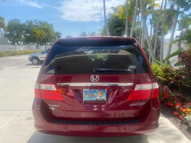2005 Redrock Pearl /Ivory Honda Odyssey TOURING LOW MILES 62,337 FL (5FNRL38815B) with an 3.5L SOHC MPFI 24-Valve i-VTEC V6 Engine engine, Automatic transmission, located at 4701 North Dixie Hwy, Pompano Beach, FL, 33064, (954) 422-2889, 26.240938, -80.123474 - OUR WEBPAGE FLORIDACARS1.COM HAS OVER 100 PHOTOS AND FREE CARFAX LINK 2005 Honda Odyssey Touring LOADED LEATHER SUNROOF NAVIGATION Van 3.5L V6 F SOHC 24V Gasoline 28 MPG Front Wheel Drive Features ABS Brakes Air Conditioning Alloy Wheels AM/FM Stereo Automatic Transmission Auxiliary Audio Input CD A - Photo#99