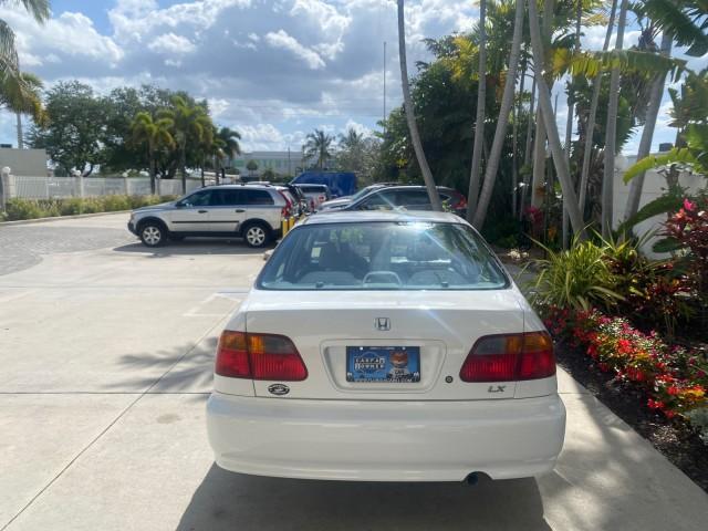 2000 Taffeta White /Gray Honda Civic LX LOW MILES 31,619 1 OWNER (2HGEJ667XYH) with an 1.6L SOHC 16-Valve I4 Engine engine, Automatic transmission, located at 4701 North Dixie Hwy, Pompano Beach, FL, 33064, (954) 422-2889, 26.240938, -80.123474 - OUR WEBPAGE FLORIDACARS1.COM HAS OVER 100 PHOTOS AND FREE CARFAX LINK 2000 Honda Civic LX 1 OWNER Sedan 4 DR 1.6L I4 F SOHC 16V Gasoline 36 MPG Front Wheel Drive Features ABS Brakes Air Conditioning AM/FM Stereo Automatic Transmission Cloth Seats Cruise Control Power Locks Power Mirrors Power Window - Photo#6