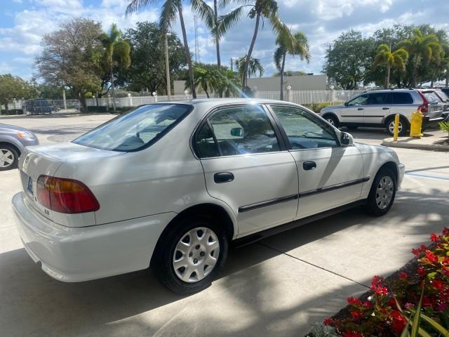 2000 Taffeta White /Gray Honda Civic LX LOW MILES 31,619 1 OWNER (2HGEJ667XYH) with an 1.6L SOHC 16-Valve I4 Engine engine, Automatic transmission, located at 4701 North Dixie Hwy, Pompano Beach, FL, 33064, (954) 422-2889, 26.240938, -80.123474 - OUR WEBPAGE FLORIDACARS1.COM HAS OVER 100 PHOTOS AND FREE CARFAX LINK 2000 Honda Civic LX 1 OWNER Sedan 4 DR 1.6L I4 F SOHC 16V Gasoline 36 MPG Front Wheel Drive Features ABS Brakes Air Conditioning AM/FM Stereo Automatic Transmission Cloth Seats Cruise Control Power Locks Power Mirrors Power Window - Photo#7