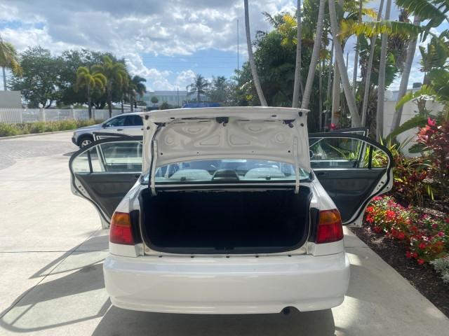 2000 Taffeta White /Gray Honda Civic LX LOW MILES 31,619 1 OWNER (2HGEJ667XYH) with an 1.6L SOHC 16-Valve I4 Engine engine, Automatic transmission, located at 4701 North Dixie Hwy, Pompano Beach, FL, 33064, (954) 422-2889, 26.240938, -80.123474 - OUR WEBPAGE FLORIDACARS1.COM HAS OVER 100 PHOTOS AND FREE CARFAX LINK 2000 Honda Civic LX 1 OWNER Sedan 4 DR 1.6L I4 F SOHC 16V Gasoline 36 MPG Front Wheel Drive Features ABS Brakes Air Conditioning AM/FM Stereo Automatic Transmission Cloth Seats Cruise Control Power Locks Power Mirrors Power Window - Photo#15