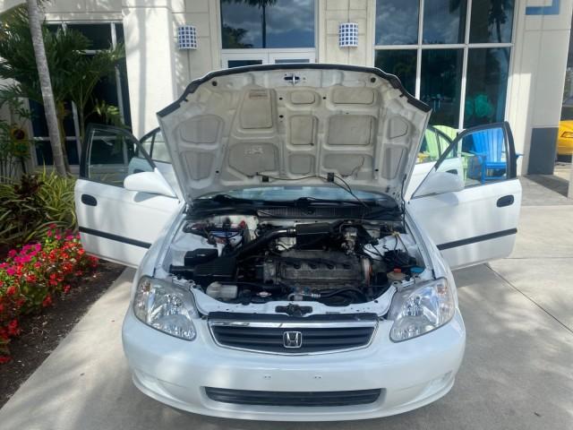 2000 Taffeta White /Gray Honda Civic LX LOW MILES 31,619 1 OWNER (2HGEJ667XYH) with an 1.6L SOHC 16-Valve I4 Engine engine, Automatic transmission, located at 4701 North Dixie Hwy, Pompano Beach, FL, 33064, (954) 422-2889, 26.240938, -80.123474 - OUR WEBPAGE FLORIDACARS1.COM HAS OVER 100 PHOTOS AND FREE CARFAX LINK 2000 Honda Civic LX 1 OWNER Sedan 4 DR 1.6L I4 F SOHC 16V Gasoline 36 MPG Front Wheel Drive Features ABS Brakes Air Conditioning AM/FM Stereo Automatic Transmission Cloth Seats Cruise Control Power Locks Power Mirrors Power Window - Photo#17
