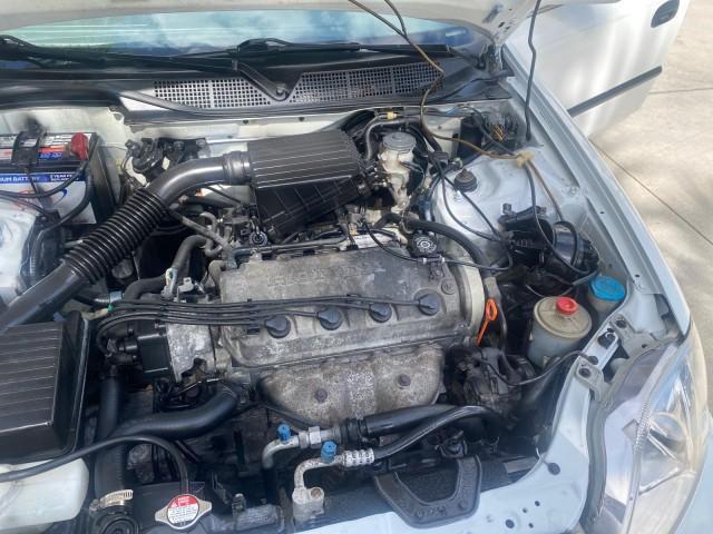 2000 Taffeta White /Gray Honda Civic LX LOW MILES 31,619 1 OWNER (2HGEJ667XYH) with an 1.6L SOHC 16-Valve I4 Engine engine, Automatic transmission, located at 4701 North Dixie Hwy, Pompano Beach, FL, 33064, (954) 422-2889, 26.240938, -80.123474 - OUR WEBPAGE FLORIDACARS1.COM HAS OVER 100 PHOTOS AND FREE CARFAX LINK 2000 Honda Civic LX 1 OWNER Sedan 4 DR 1.6L I4 F SOHC 16V Gasoline 36 MPG Front Wheel Drive Features ABS Brakes Air Conditioning AM/FM Stereo Automatic Transmission Cloth Seats Cruise Control Power Locks Power Mirrors Power Window - Photo#25