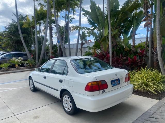 2000 Taffeta White /Gray Honda Civic LX LOW MILES 31,619 1 OWNER (2HGEJ667XYH) with an 1.6L SOHC 16-Valve I4 Engine engine, Automatic transmission, located at 4701 North Dixie Hwy, Pompano Beach, FL, 33064, (954) 422-2889, 26.240938, -80.123474 - OUR WEBPAGE FLORIDACARS1.COM HAS OVER 100 PHOTOS AND FREE CARFAX LINK 2000 Honda Civic LX 1 OWNER Sedan 4 DR 1.6L I4 F SOHC 16V Gasoline 36 MPG Front Wheel Drive Features ABS Brakes Air Conditioning AM/FM Stereo Automatic Transmission Cloth Seats Cruise Control Power Locks Power Mirrors Power Window - Photo#32