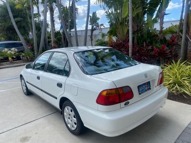 2000 Taffeta White /Gray Honda Civic LX LOW MILES 31,619 1 OWNER (2HGEJ667XYH) with an 1.6L SOHC 16-Valve I4 Engine engine, Automatic transmission, located at 4701 North Dixie Hwy, Pompano Beach, FL, 33064, (954) 422-2889, 26.240938, -80.123474 - OUR WEBPAGE FLORIDACARS1.COM HAS OVER 100 PHOTOS AND FREE CARFAX LINK 2000 Honda Civic LX 1 OWNER Sedan 4 DR 1.6L I4 F SOHC 16V Gasoline 36 MPG Front Wheel Drive Features ABS Brakes Air Conditioning AM/FM Stereo Automatic Transmission Cloth Seats Cruise Control Power Locks Power Mirrors Power Window - Photo#33