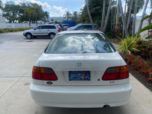 2000 Taffeta White /Gray Honda Civic LX LOW MILES 31,619 1 OWNER (2HGEJ667XYH) with an 1.6L SOHC 16-Valve I4 Engine engine, Automatic transmission, located at 4701 North Dixie Hwy, Pompano Beach, FL, 33064, (954) 422-2889, 26.240938, -80.123474 - OUR WEBPAGE FLORIDACARS1.COM HAS OVER 100 PHOTOS AND FREE CARFAX LINK 2000 Honda Civic LX 1 OWNER Sedan 4 DR 1.6L I4 F SOHC 16V Gasoline 36 MPG Front Wheel Drive Features ABS Brakes Air Conditioning AM/FM Stereo Automatic Transmission Cloth Seats Cruise Control Power Locks Power Mirrors Power Window - Photo#35