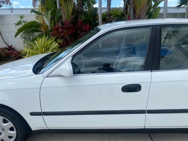 2000 Taffeta White /Gray Honda Civic LX LOW MILES 31,619 1 OWNER (2HGEJ667XYH) with an 1.6L SOHC 16-Valve I4 Engine engine, Automatic transmission, located at 4701 North Dixie Hwy, Pompano Beach, FL, 33064, (954) 422-2889, 26.240938, -80.123474 - OUR WEBPAGE FLORIDACARS1.COM HAS OVER 100 PHOTOS AND FREE CARFAX LINK 2000 Honda Civic LX 1 OWNER Sedan 4 DR 1.6L I4 F SOHC 16V Gasoline 36 MPG Front Wheel Drive Features ABS Brakes Air Conditioning AM/FM Stereo Automatic Transmission Cloth Seats Cruise Control Power Locks Power Mirrors Power Window - Photo#37