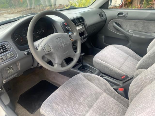 2000 Taffeta White /Gray Honda Civic LX LOW MILES 31,619 1 OWNER (2HGEJ667XYH) with an 1.6L SOHC 16-Valve I4 Engine engine, Automatic transmission, located at 4701 North Dixie Hwy, Pompano Beach, FL, 33064, (954) 422-2889, 26.240938, -80.123474 - OUR WEBPAGE FLORIDACARS1.COM HAS OVER 100 PHOTOS AND FREE CARFAX LINK 2000 Honda Civic LX 1 OWNER Sedan 4 DR 1.6L I4 F SOHC 16V Gasoline 36 MPG Front Wheel Drive Features ABS Brakes Air Conditioning AM/FM Stereo Automatic Transmission Cloth Seats Cruise Control Power Locks Power Mirrors Power Window - Photo#45