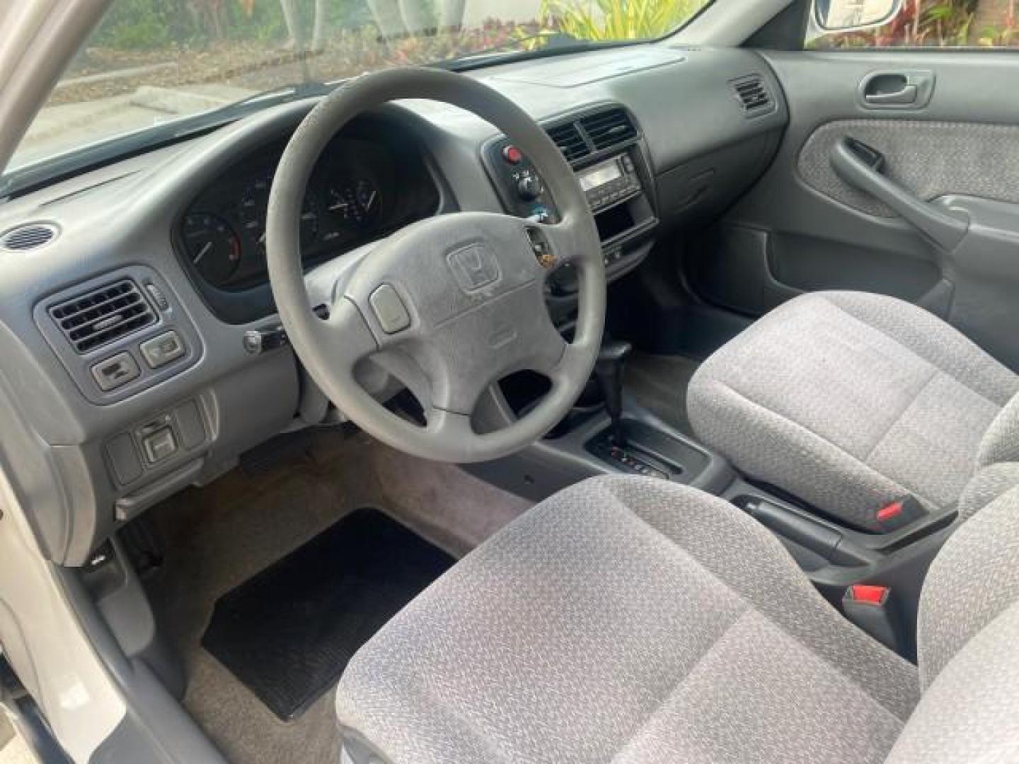 2000 Taffeta White /Gray Honda Civic LX LOW MILES 31,619 1 OWNER (2HGEJ667XYH) with an 1.6L SOHC 16-Valve I4 Engine engine, Automatic transmission, located at 4701 North Dixie Hwy, Pompano Beach, FL, 33064, (954) 422-2889, 26.240938, -80.123474 - OUR WEBPAGE FLORIDACARS1.COM HAS OVER 100 PHOTOS AND FREE CARFAX LINK 2000 Honda Civic LX 1 OWNER Sedan 4 DR 1.6L I4 F SOHC 16V Gasoline 36 MPG Front Wheel Drive Features ABS Brakes Air Conditioning AM/FM Stereo Automatic Transmission Cloth Seats Cruise Control Power Locks Power Mirrors Power Window - Photo#46