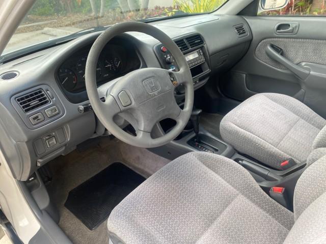 2000 Taffeta White /Gray Honda Civic LX LOW MILES 31,619 1 OWNER (2HGEJ667XYH) with an 1.6L SOHC 16-Valve I4 Engine engine, Automatic transmission, located at 4701 North Dixie Hwy, Pompano Beach, FL, 33064, (954) 422-2889, 26.240938, -80.123474 - OUR WEBPAGE FLORIDACARS1.COM HAS OVER 100 PHOTOS AND FREE CARFAX LINK 2000 Honda Civic LX 1 OWNER Sedan 4 DR 1.6L I4 F SOHC 16V Gasoline 36 MPG Front Wheel Drive Features ABS Brakes Air Conditioning AM/FM Stereo Automatic Transmission Cloth Seats Cruise Control Power Locks Power Mirrors Power Window - Photo#46