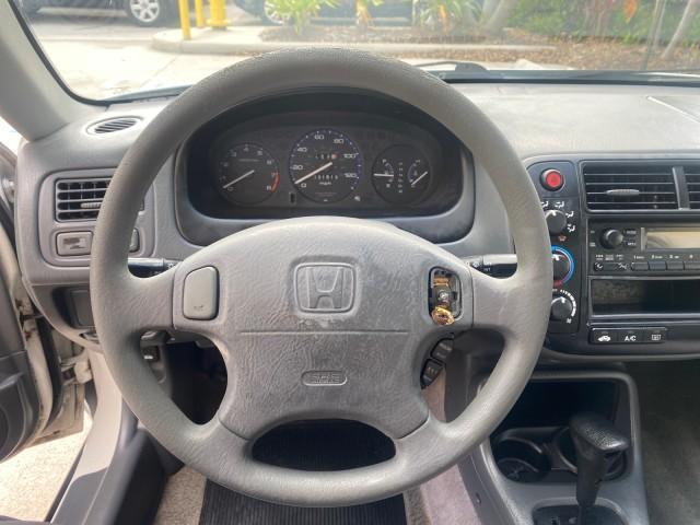 2000 Taffeta White /Gray Honda Civic LX LOW MILES 31,619 1 OWNER (2HGEJ667XYH) with an 1.6L SOHC 16-Valve I4 Engine engine, Automatic transmission, located at 4701 North Dixie Hwy, Pompano Beach, FL, 33064, (954) 422-2889, 26.240938, -80.123474 - OUR WEBPAGE FLORIDACARS1.COM HAS OVER 100 PHOTOS AND FREE CARFAX LINK 2000 Honda Civic LX 1 OWNER Sedan 4 DR 1.6L I4 F SOHC 16V Gasoline 36 MPG Front Wheel Drive Features ABS Brakes Air Conditioning AM/FM Stereo Automatic Transmission Cloth Seats Cruise Control Power Locks Power Mirrors Power Window - Photo#47