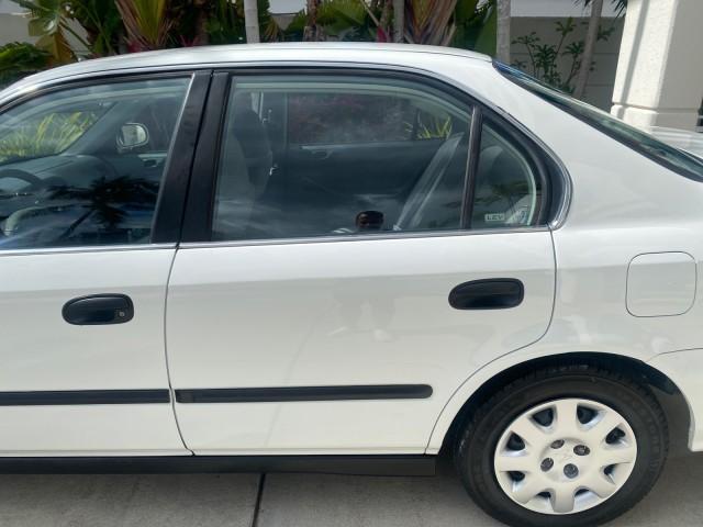 2000 Taffeta White /Gray Honda Civic LX LOW MILES 31,619 1 OWNER (2HGEJ667XYH) with an 1.6L SOHC 16-Valve I4 Engine engine, Automatic transmission, located at 4701 North Dixie Hwy, Pompano Beach, FL, 33064, (954) 422-2889, 26.240938, -80.123474 - OUR WEBPAGE FLORIDACARS1.COM HAS OVER 100 PHOTOS AND FREE CARFAX LINK 2000 Honda Civic LX 1 OWNER Sedan 4 DR 1.6L I4 F SOHC 16V Gasoline 36 MPG Front Wheel Drive Features ABS Brakes Air Conditioning AM/FM Stereo Automatic Transmission Cloth Seats Cruise Control Power Locks Power Mirrors Power Window - Photo#64