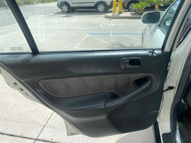 2000 Taffeta White /Gray Honda Civic LX LOW MILES 31,619 1 OWNER (2HGEJ667XYH) with an 1.6L SOHC 16-Valve I4 Engine engine, Automatic transmission, located at 4701 North Dixie Hwy, Pompano Beach, FL, 33064, (954) 422-2889, 26.240938, -80.123474 - OUR WEBPAGE FLORIDACARS1.COM HAS OVER 100 PHOTOS AND FREE CARFAX LINK 2000 Honda Civic LX 1 OWNER Sedan 4 DR 1.6L I4 F SOHC 16V Gasoline 36 MPG Front Wheel Drive Features ABS Brakes Air Conditioning AM/FM Stereo Automatic Transmission Cloth Seats Cruise Control Power Locks Power Mirrors Power Window - Photo#66