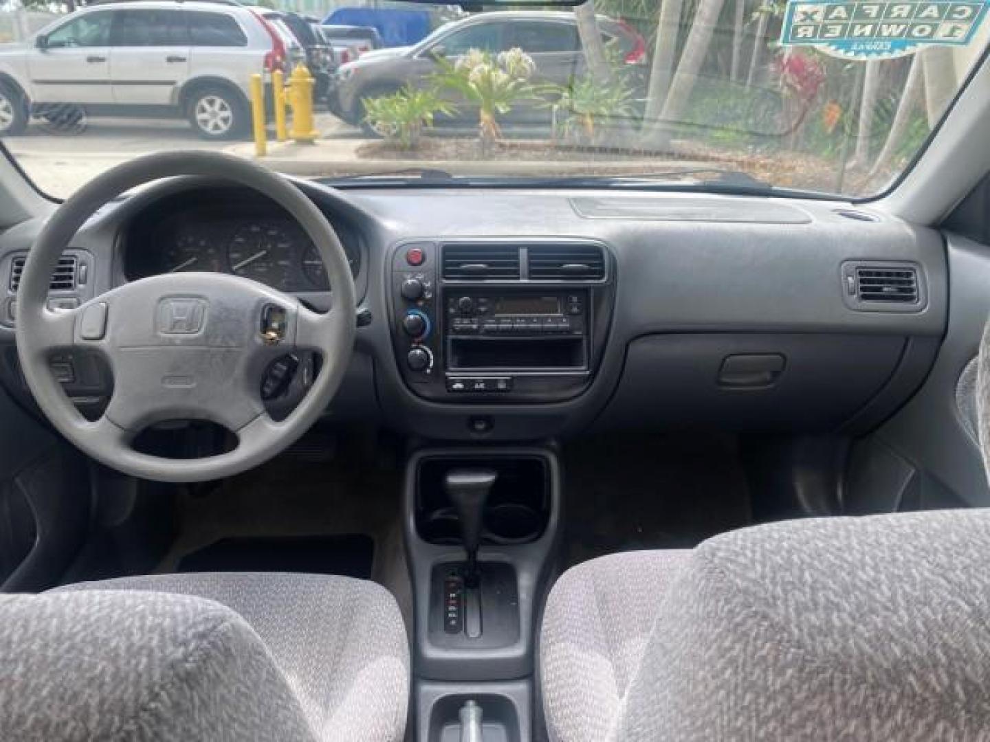 2000 Taffeta White /Gray Honda Civic LX LOW MILES 31,619 1 OWNER (2HGEJ667XYH) with an 1.6L SOHC 16-Valve I4 Engine engine, Automatic transmission, located at 4701 North Dixie Hwy, Pompano Beach, FL, 33064, (954) 422-2889, 26.240938, -80.123474 - OUR WEBPAGE FLORIDACARS1.COM HAS OVER 100 PHOTOS AND FREE CARFAX LINK 2000 Honda Civic LX 1 OWNER Sedan 4 DR 1.6L I4 F SOHC 16V Gasoline 36 MPG Front Wheel Drive Features ABS Brakes Air Conditioning AM/FM Stereo Automatic Transmission Cloth Seats Cruise Control Power Locks Power Mirrors Power Window - Photo#72