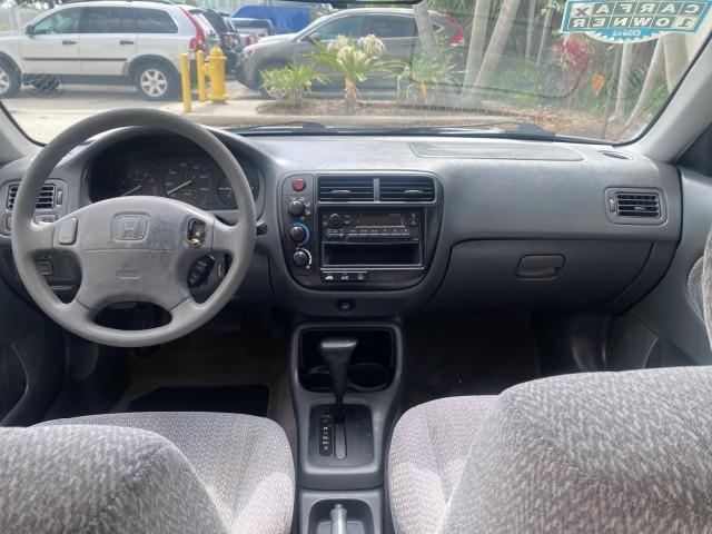 2000 Taffeta White /Gray Honda Civic LX LOW MILES 31,619 1 OWNER (2HGEJ667XYH) with an 1.6L SOHC 16-Valve I4 Engine engine, Automatic transmission, located at 4701 North Dixie Hwy, Pompano Beach, FL, 33064, (954) 422-2889, 26.240938, -80.123474 - OUR WEBPAGE FLORIDACARS1.COM HAS OVER 100 PHOTOS AND FREE CARFAX LINK 2000 Honda Civic LX 1 OWNER Sedan 4 DR 1.6L I4 F SOHC 16V Gasoline 36 MPG Front Wheel Drive Features ABS Brakes Air Conditioning AM/FM Stereo Automatic Transmission Cloth Seats Cruise Control Power Locks Power Mirrors Power Window - Photo#72