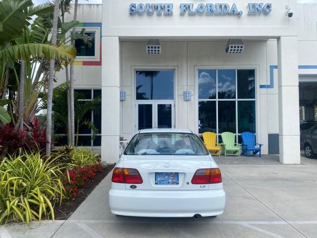 2000 Taffeta White /Gray Honda Civic LX LOW MILES 31,619 1 OWNER (2HGEJ667XYH) with an 1.6L SOHC 16-Valve I4 Engine engine, Automatic transmission, located at 4701 North Dixie Hwy, Pompano Beach, FL, 33064, (954) 422-2889, 26.240938, -80.123474 - OUR WEBPAGE FLORIDACARS1.COM HAS OVER 100 PHOTOS AND FREE CARFAX LINK 2000 Honda Civic LX 1 OWNER Sedan 4 DR 1.6L I4 F SOHC 16V Gasoline 36 MPG Front Wheel Drive Features ABS Brakes Air Conditioning AM/FM Stereo Automatic Transmission Cloth Seats Cruise Control Power Locks Power Mirrors Power Window - Photo#83