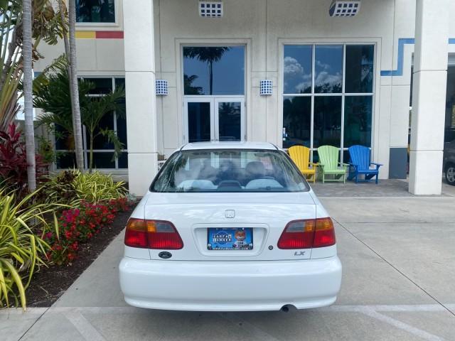 2000 Taffeta White /Gray Honda Civic LX LOW MILES 31,619 1 OWNER (2HGEJ667XYH) with an 1.6L SOHC 16-Valve I4 Engine engine, Automatic transmission, located at 4701 North Dixie Hwy, Pompano Beach, FL, 33064, (954) 422-2889, 26.240938, -80.123474 - OUR WEBPAGE FLORIDACARS1.COM HAS OVER 100 PHOTOS AND FREE CARFAX LINK 2000 Honda Civic LX 1 OWNER Sedan 4 DR 1.6L I4 F SOHC 16V Gasoline 36 MPG Front Wheel Drive Features ABS Brakes Air Conditioning AM/FM Stereo Automatic Transmission Cloth Seats Cruise Control Power Locks Power Mirrors Power Window - Photo#84