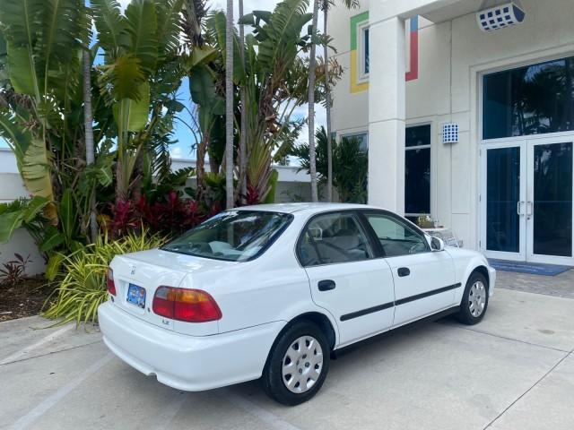 2000 Taffeta White /Gray Honda Civic LX LOW MILES 31,619 1 OWNER (2HGEJ667XYH) with an 1.6L SOHC 16-Valve I4 Engine engine, Automatic transmission, located at 4701 North Dixie Hwy, Pompano Beach, FL, 33064, (954) 422-2889, 26.240938, -80.123474 - OUR WEBPAGE FLORIDACARS1.COM HAS OVER 100 PHOTOS AND FREE CARFAX LINK 2000 Honda Civic LX 1 OWNER Sedan 4 DR 1.6L I4 F SOHC 16V Gasoline 36 MPG Front Wheel Drive Features ABS Brakes Air Conditioning AM/FM Stereo Automatic Transmission Cloth Seats Cruise Control Power Locks Power Mirrors Power Window - Photo#85