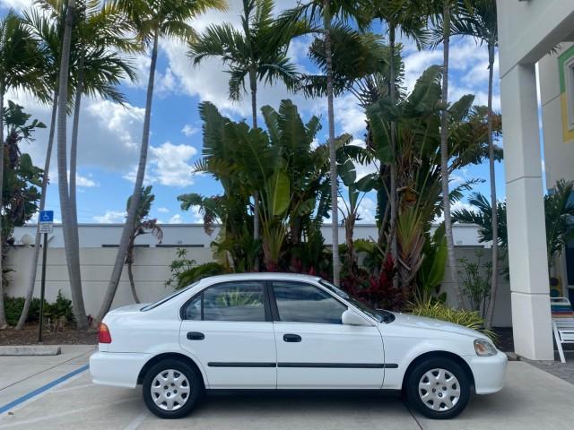2000 Taffeta White /Gray Honda Civic LX LOW MILES 31,619 1 OWNER (2HGEJ667XYH) with an 1.6L SOHC 16-Valve I4 Engine engine, Automatic transmission, located at 4701 North Dixie Hwy, Pompano Beach, FL, 33064, (954) 422-2889, 26.240938, -80.123474 - OUR WEBPAGE FLORIDACARS1.COM HAS OVER 100 PHOTOS AND FREE CARFAX LINK 2000 Honda Civic LX 1 OWNER Sedan 4 DR 1.6L I4 F SOHC 16V Gasoline 36 MPG Front Wheel Drive Features ABS Brakes Air Conditioning AM/FM Stereo Automatic Transmission Cloth Seats Cruise Control Power Locks Power Mirrors Power Window - Photo#87