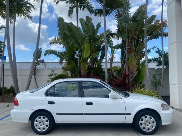 2000 Taffeta White /Gray Honda Civic LX LOW MILES 31,619 1 OWNER (2HGEJ667XYH) with an 1.6L SOHC 16-Valve I4 Engine engine, Automatic transmission, located at 4701 North Dixie Hwy, Pompano Beach, FL, 33064, (954) 422-2889, 26.240938, -80.123474 - OUR WEBPAGE FLORIDACARS1.COM HAS OVER 100 PHOTOS AND FREE CARFAX LINK 2000 Honda Civic LX 1 OWNER Sedan 4 DR 1.6L I4 F SOHC 16V Gasoline 36 MPG Front Wheel Drive Features ABS Brakes Air Conditioning AM/FM Stereo Automatic Transmission Cloth Seats Cruise Control Power Locks Power Mirrors Power Window - Photo#88