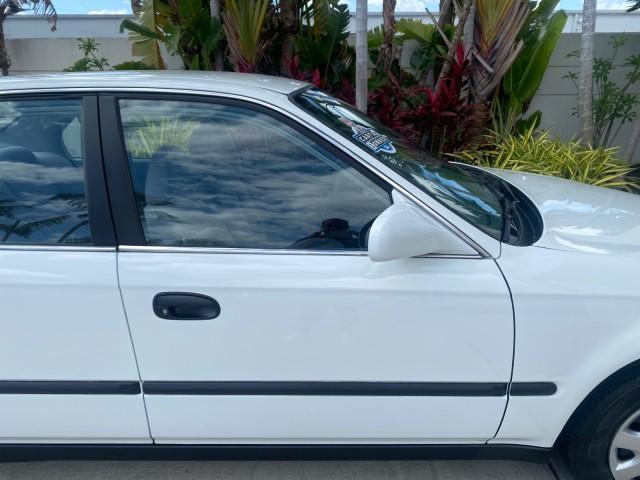 2000 Taffeta White /Gray Honda Civic LX LOW MILES 31,619 1 OWNER (2HGEJ667XYH) with an 1.6L SOHC 16-Valve I4 Engine engine, Automatic transmission, located at 4701 North Dixie Hwy, Pompano Beach, FL, 33064, (954) 422-2889, 26.240938, -80.123474 - OUR WEBPAGE FLORIDACARS1.COM HAS OVER 100 PHOTOS AND FREE CARFAX LINK 2000 Honda Civic LX 1 OWNER Sedan 4 DR 1.6L I4 F SOHC 16V Gasoline 36 MPG Front Wheel Drive Features ABS Brakes Air Conditioning AM/FM Stereo Automatic Transmission Cloth Seats Cruise Control Power Locks Power Mirrors Power Window - Photo#96