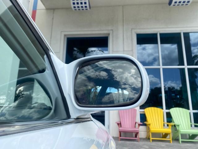 2000 Taffeta White /Gray Honda Civic LX LOW MILES 31,619 1 OWNER (2HGEJ667XYH) with an 1.6L SOHC 16-Valve I4 Engine engine, Automatic transmission, located at 4701 North Dixie Hwy, Pompano Beach, FL, 33064, (954) 422-2889, 26.240938, -80.123474 - OUR WEBPAGE FLORIDACARS1.COM HAS OVER 100 PHOTOS AND FREE CARFAX LINK 2000 Honda Civic LX 1 OWNER Sedan 4 DR 1.6L I4 F SOHC 16V Gasoline 36 MPG Front Wheel Drive Features ABS Brakes Air Conditioning AM/FM Stereo Automatic Transmission Cloth Seats Cruise Control Power Locks Power Mirrors Power Window - Photo#98