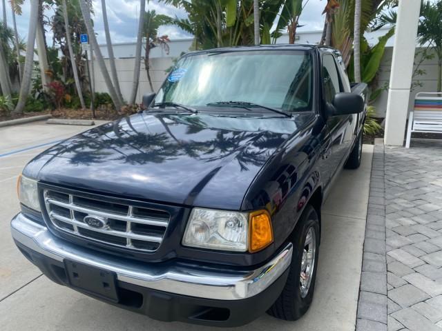 2003 Deep Wedgewood Blue Metallic /Dark Graphite Ford Ranger XLT AUTO X CAB LOW MILES 76,750 (1FTYR44V53P) with an 3.0L SEFI Flex-Fuel FFV V6 Engine engine, Automatic transmission, located at 4701 North Dixie Hwy, Pompano Beach, FL, 33064, (954) 422-2889, 26.240938, -80.123474 - OUR WEBPAGE FLORIDACARS1.COM HAS OVER 100 PHOTOS AND FREE CARFAX LINK 2003 Ford Ranger XLT AUTO AC LOADED GOOD FOR POOL SERVICE OR DELIEVERY SERVICE VERY DEPENDABLE 4 Door Extended Cab Pickup 3.0L V6 F Flex Fuel 23 MPG Rear Wheel Drive Features ABS Brakes Air Conditioning AM/FM Stereo Automatic Tran - Photo#3